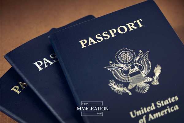 three passports on a table