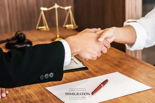 a man discussing a p visa application with a lawyer