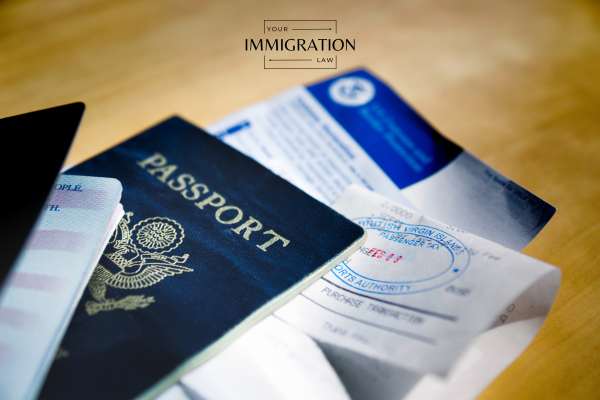 a passport and travel documents on a table