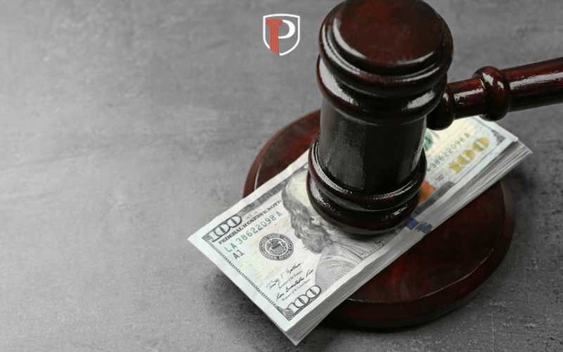 money and a gavel on a table