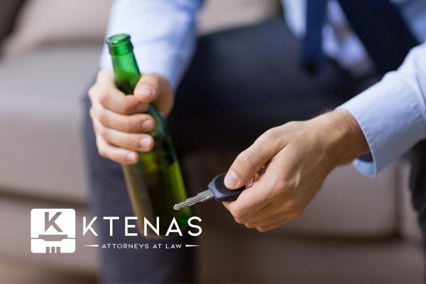 man holding a beer and his car keys