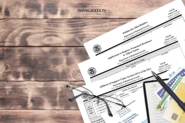 an affidavit of support and other immigration forms on a table