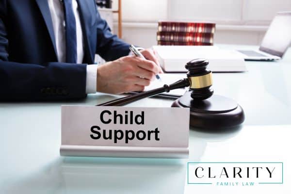 a child support attorney working on paperwork 