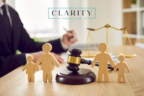 a lawyer reviewing how child support is determined in Michigan