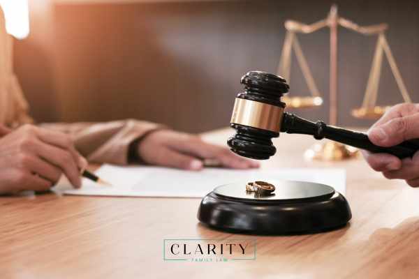 a woman meeting with an attorney to discuss a divorce
