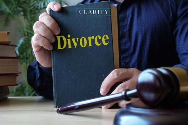 an attorney holding a family law book