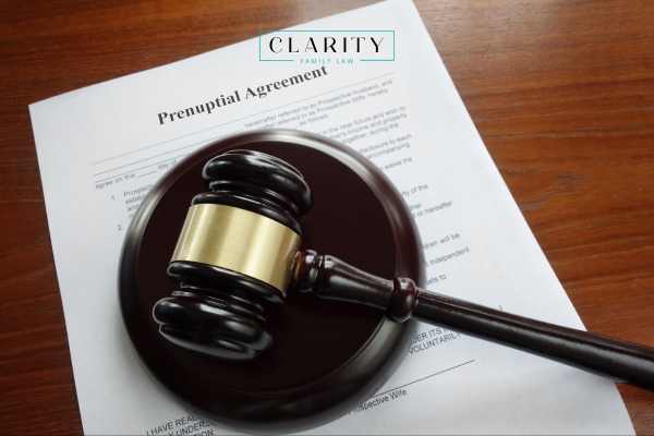 a prenuptial agreement draft and gavel on a desk