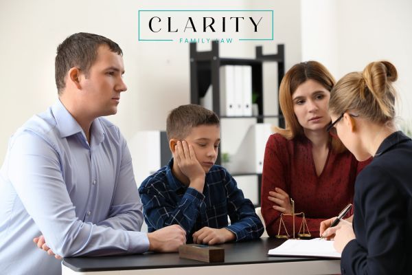 a mother and father with their child at their guardian ad litem visit