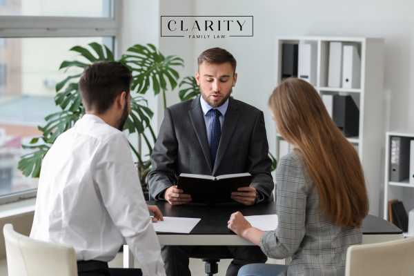 a couple meeting with a lawyer for an uncontested divorce