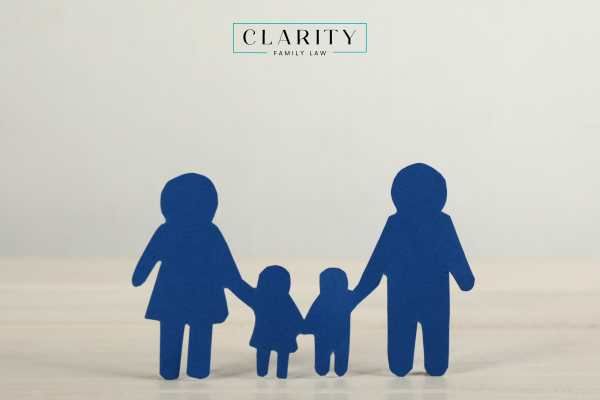 a cut out of an adoptive family in front of a white background