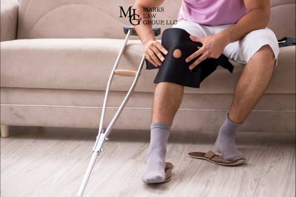 a man putting on a knee brace