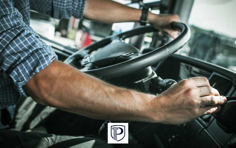 a man with a CDL driving a truck