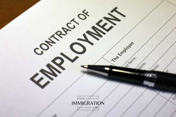 an employment contract on a desk