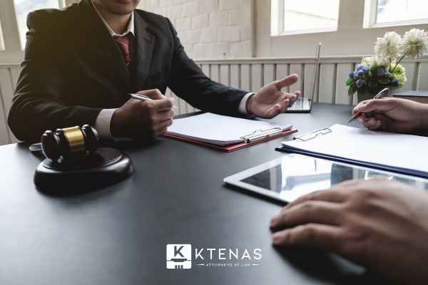 an attorney discussing charges against someone in a consultation