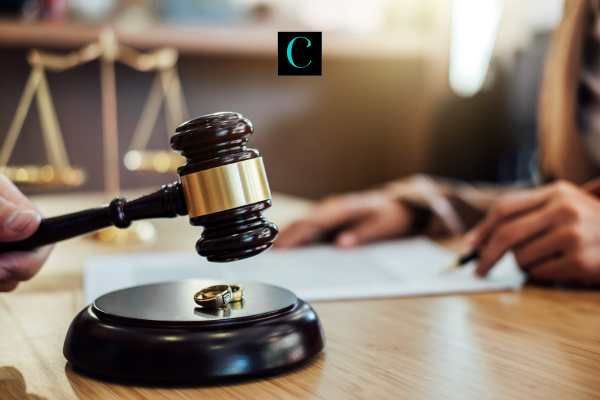 a man reviewing questions he has about divorce with a lawyer