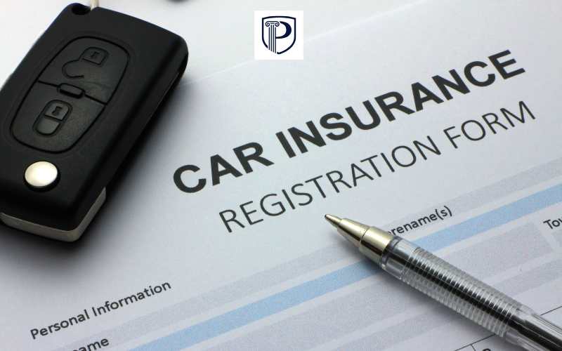 forms for car insurance on a table