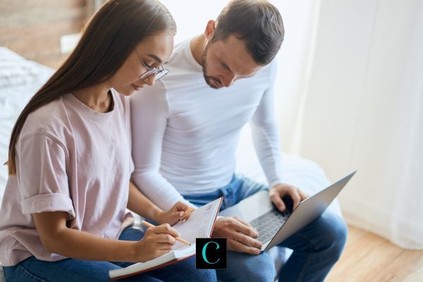 two parents making a plan to raise their child post-divorce