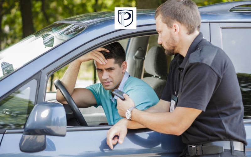 a police officer ticketing a driver
