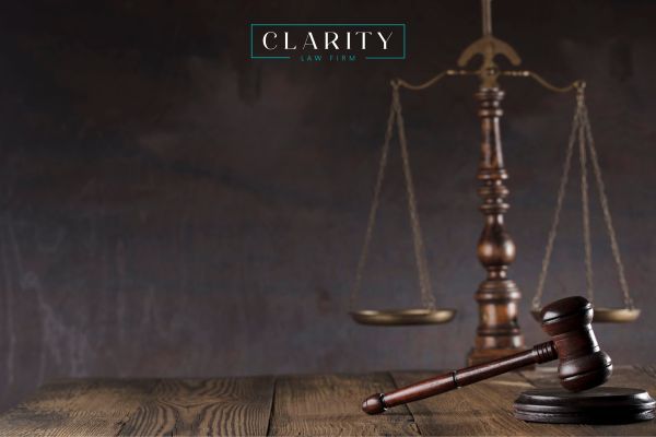 a gavel and scales on a desk