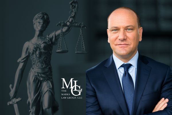 attorney with lady justice in background