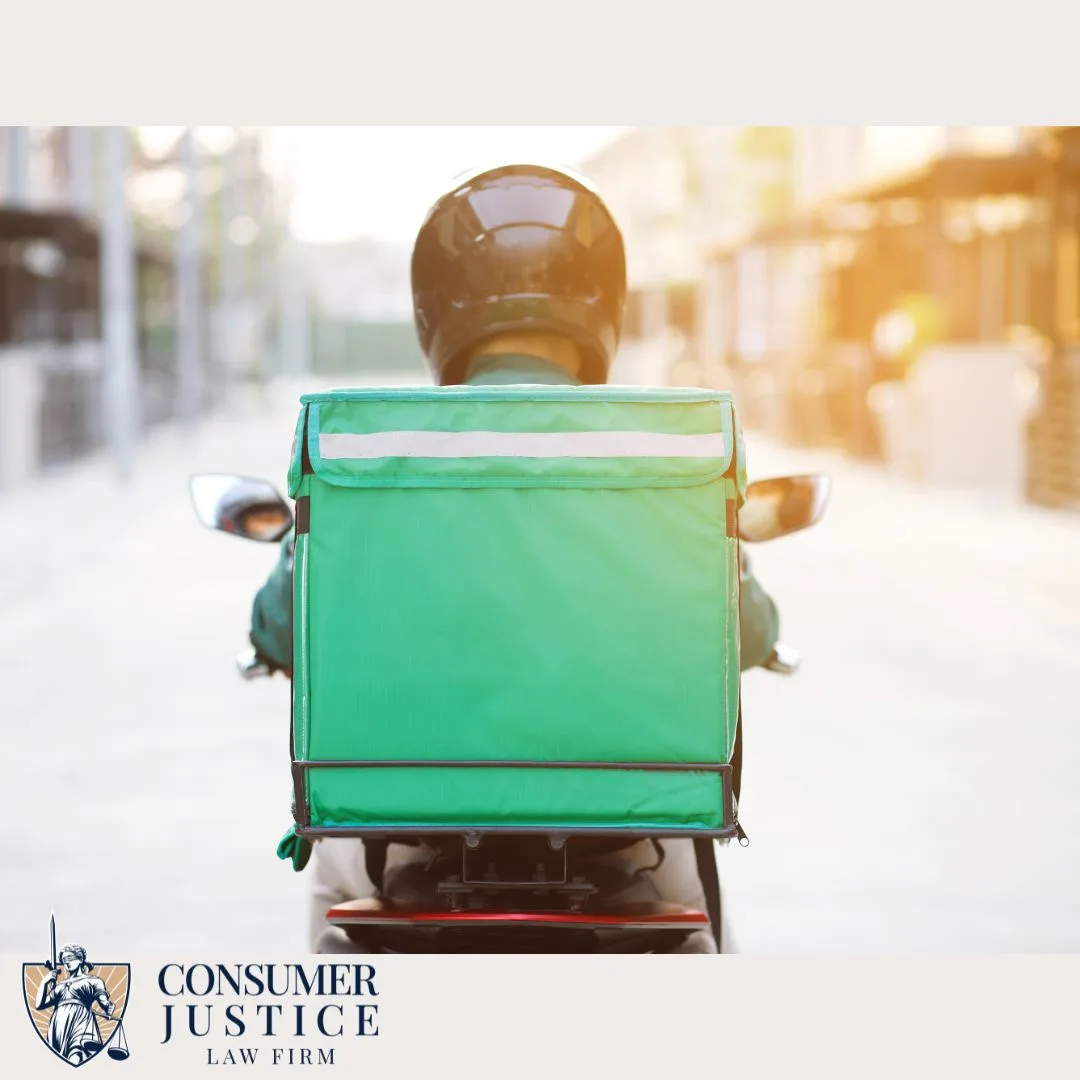 An Uber Eats deliver driver rides a motorcycle. It conveys that Uber Eats background check errors aren't career-ending.