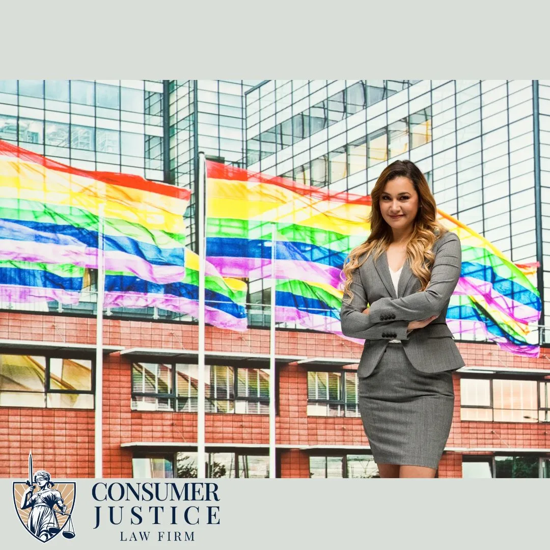 A professional stands near pride flags. It conveys that LGBTQ employment discrimination is wrong.