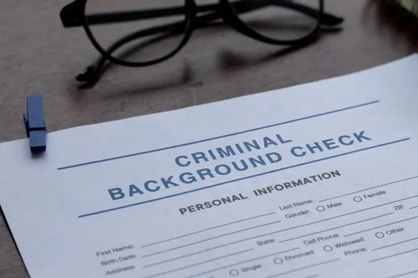 Close-up of a "Criminal Background Check" form