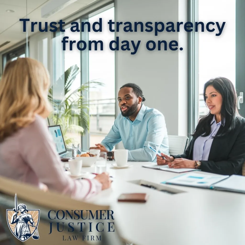 Consumer attorneys meet with clients in a conference room.