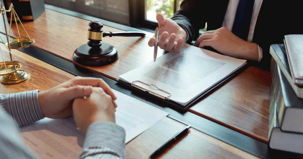 Attorney and client going over financial discovery