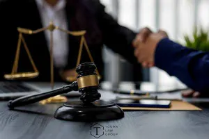 a person meeting with a defense attorney for a consultation