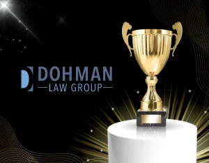 trophy with dohman law group logo