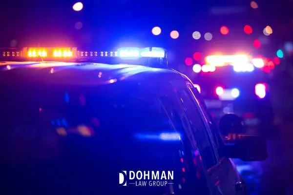 police pulling someone over at night for DUI