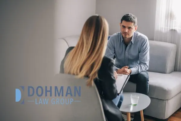 a man talking to a counselor in his rehab program after a DUI