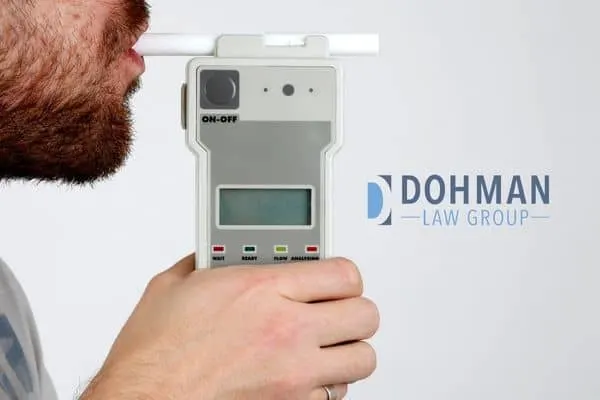 man blowing into a breathalyzer, Breathalyzer Inaccuracies