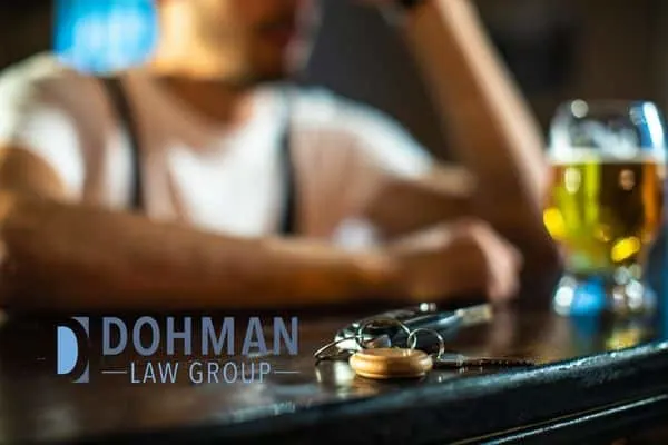 man sitting at bar with beer and car keys, DUI That Results in Death be Charged as Murder