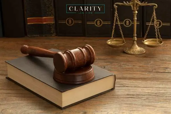 legal books and a gavel on a lawyers desk