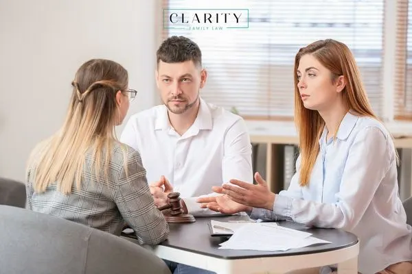 Couple speaking with an attorney discussing divorce