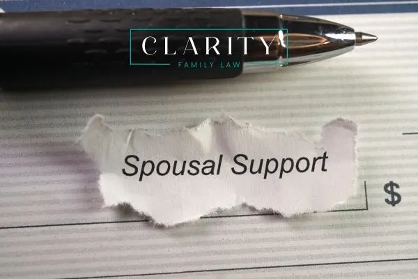 the term spousal support next to a pen