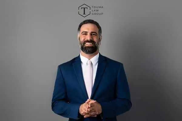 skilled defense attorney Adam Touma