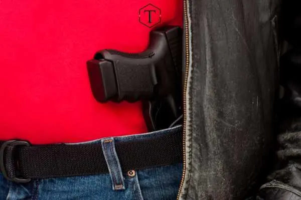 a man appendix carrying a pistol