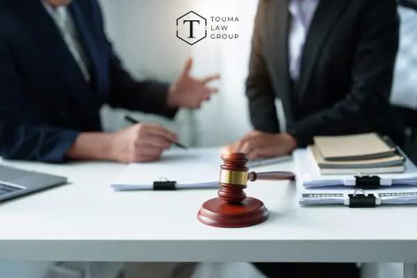 two attorneys discussing an ongoing criminal case a client is facing