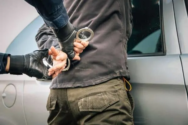 person being handcuffed, After You've Been Arrested