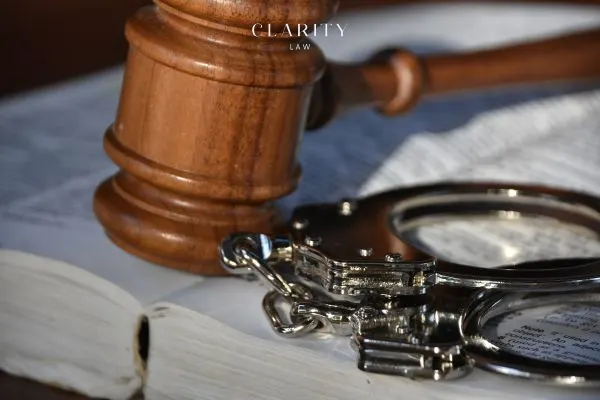 handcuffs beside a gavel
