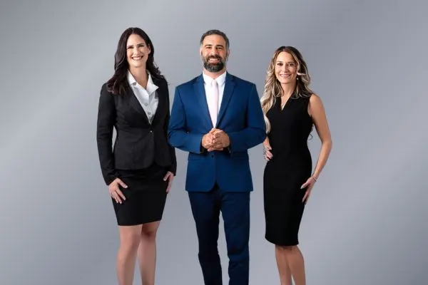 attorneys Adam Touma, Alissa Wilson and their paralegal Stephanie Jones make up the Columbia team