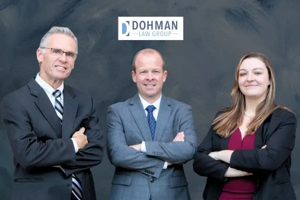 two male attorneys and one female attorney