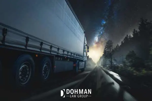 Side view of a semi-truck on a highway