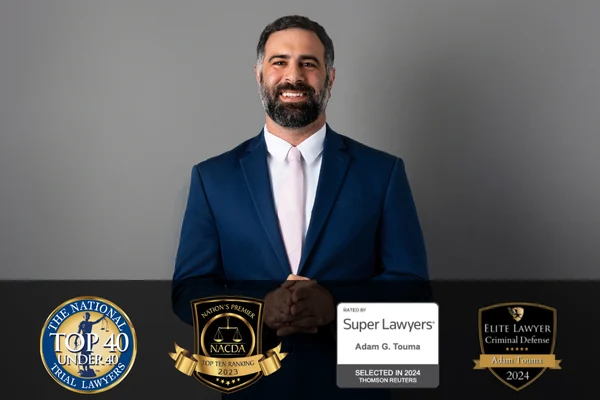 adam touma with awards