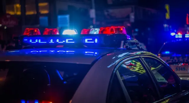 police car Police car at night with the lights on