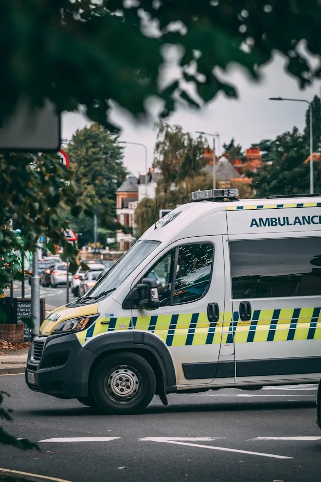 Ambulance parked on a street corner