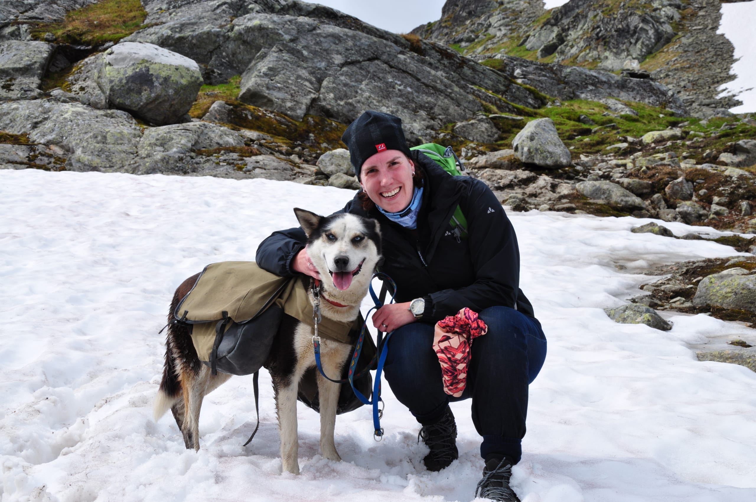 Woman and her husky guide